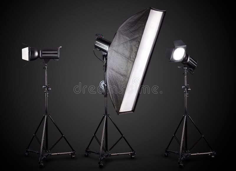 Photo Studio Lighting Stands with Flash and Softbox Isolated on the