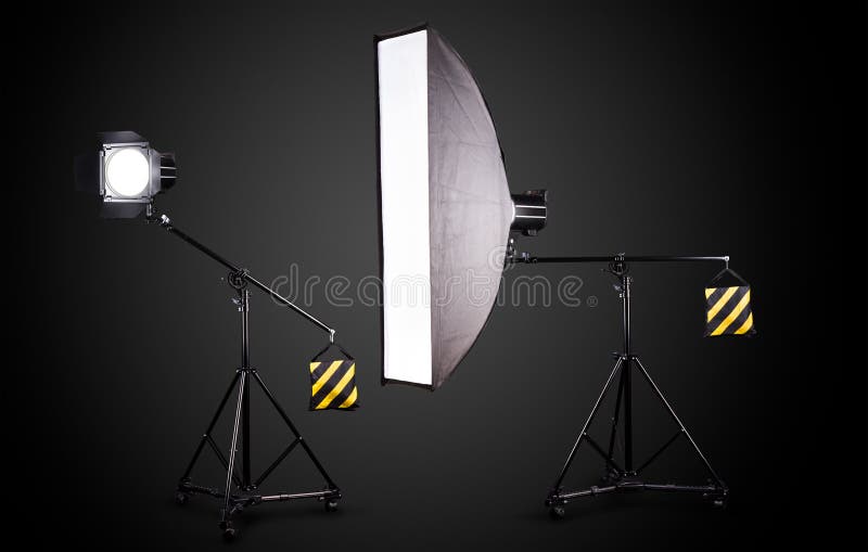 Photo Studio Lighting Stands With Flash And Softbox Isolated On The