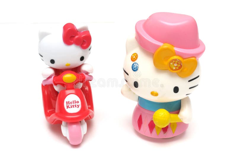 A pair of Hello Kitty figurines