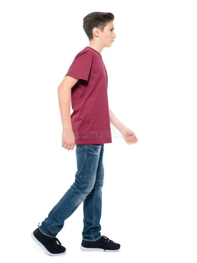 Teen boy walking - posing at studio