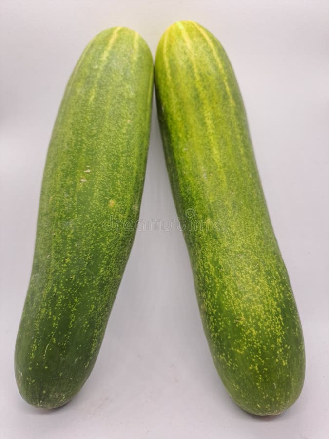 Photo of two cucumbers with a white background