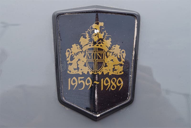 Photo of a unique Mini Cooper car logo badge celebrating 30 years of the brand. stock image Photo of a unique Mini Cooper car logo badge celebrating 30 years of the brand. stock image