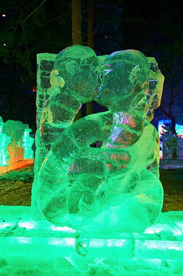The kiss of ice lamps in the park nightscape