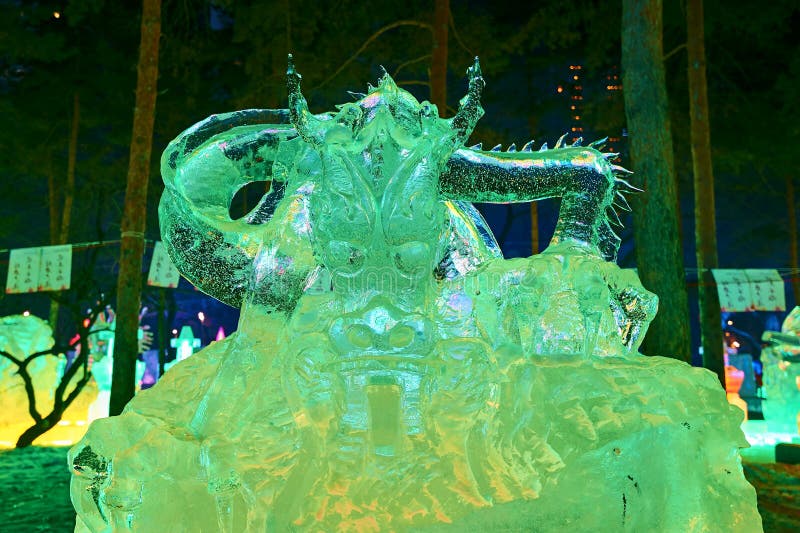 The megalosaurus of ice lamp in the park nightscape