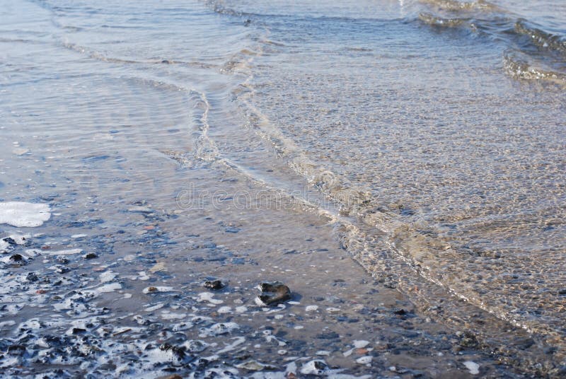 On the photo wave, shells stock image. Image of sand 240762361