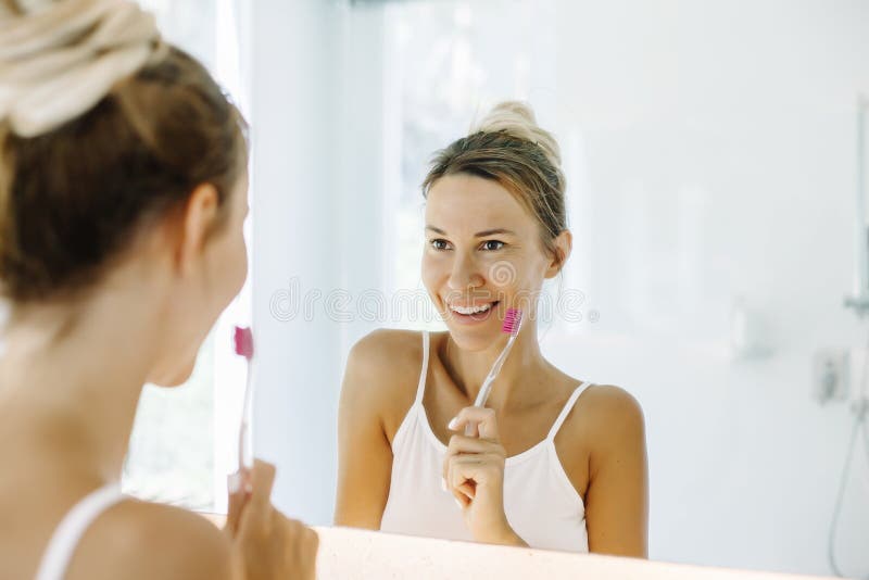 Photo Of Woman Looking At The Mirror Picture Image 109919604