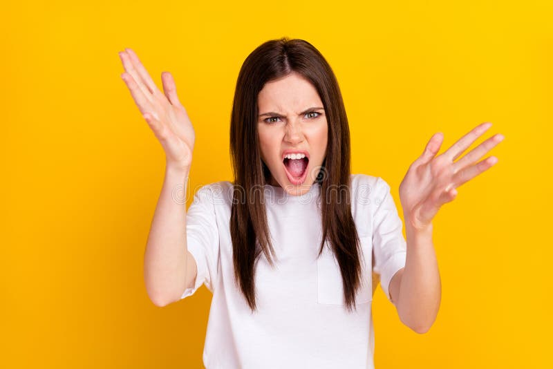 Photo of young crazy shouting angry mad furious girl having argument scandal isolated on yellow color background