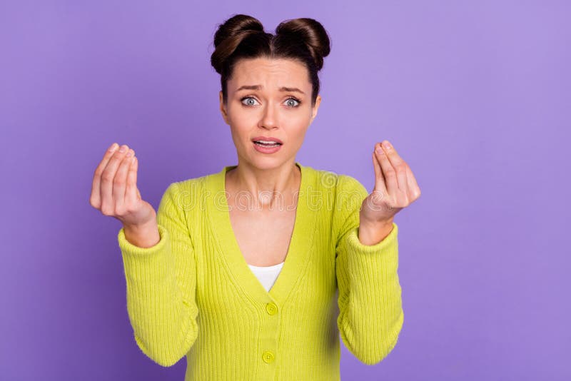 Photo of young unhappy upset sad girl with two buns on head asking begging money isolated on violet color background