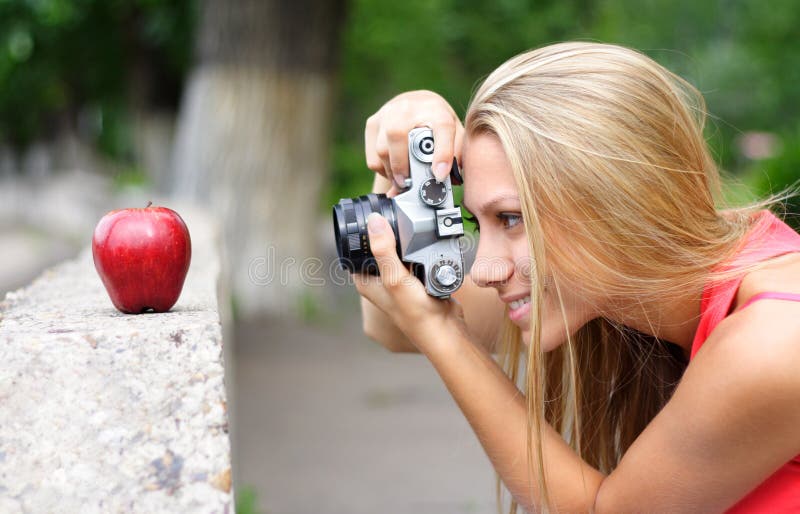 Photographer and apple