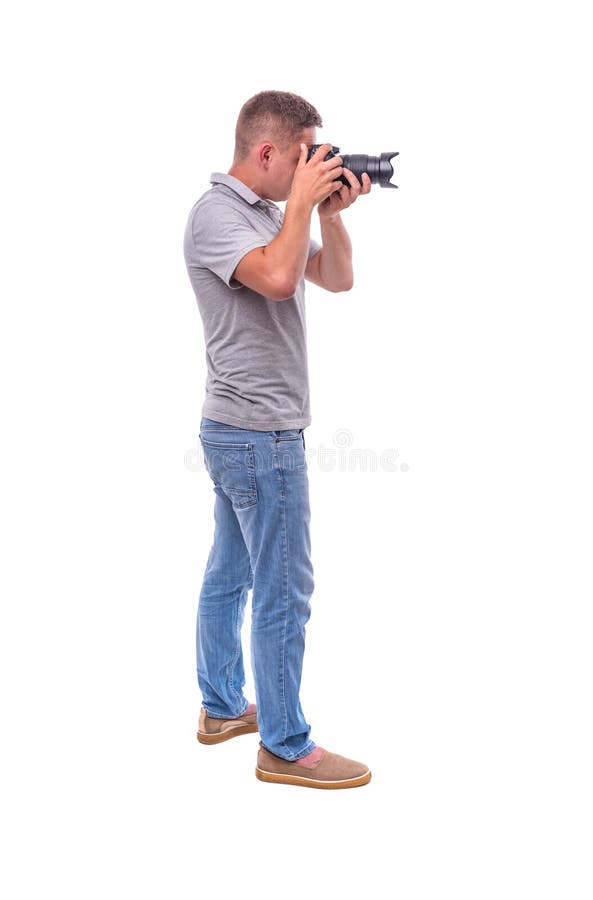 The Photographer with the Camera on White. Stock Photo Image of
