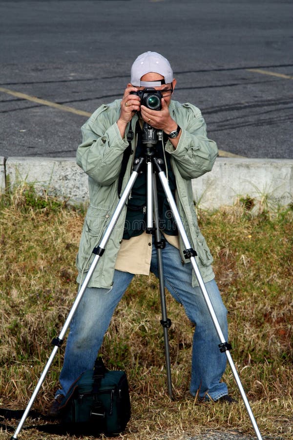 Photographer with gears stock photo. Image of photographer 12785368