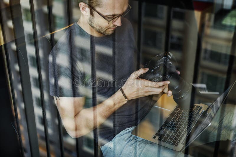 Photographer Journalist Working Studion Agency Concept stock image