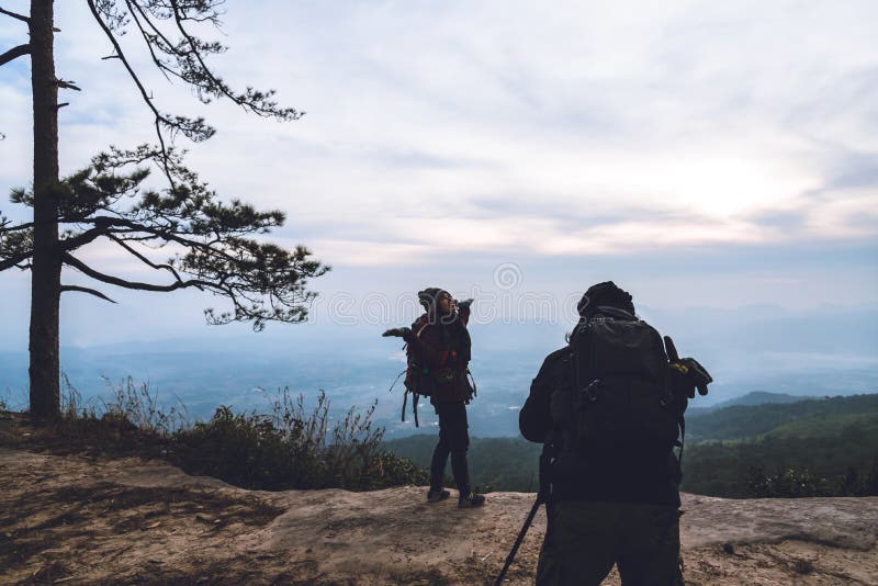 Photographer lover women and men asians travel relax in the holiday. Photograph mountain landscapes atmosphere in the morning. In royalty free stock photos Photographer lover women and men asians travel relax in the holiday. Photograph mountain landscapes atmosphere in the morning. In royalty free stock photos