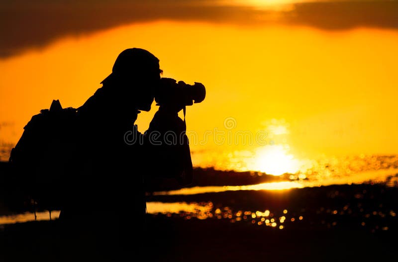 Photographer silhouette at sunset royalty free stock photography Photographer silhouette at sunset royalty free stock photography