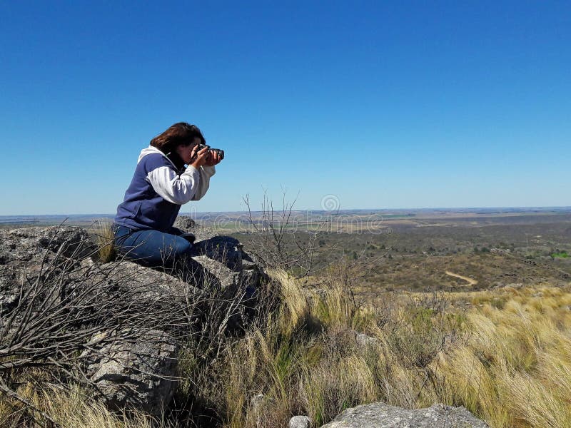 Photographer taking samples of nature