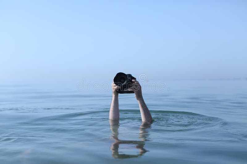 Photographer in water