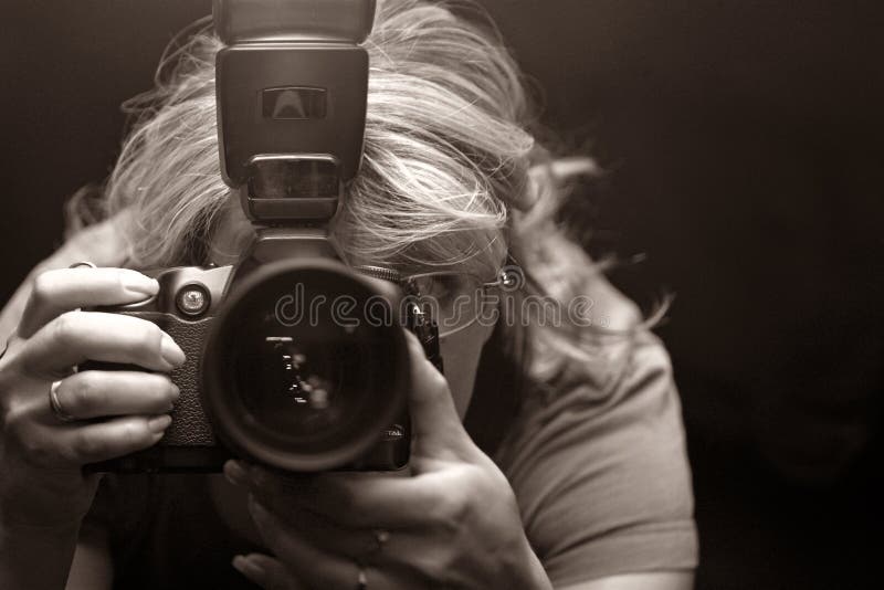 The photographer works. Self-portrait. b/w + sepia. The photographer works. Self-portrait. b/w + sepia