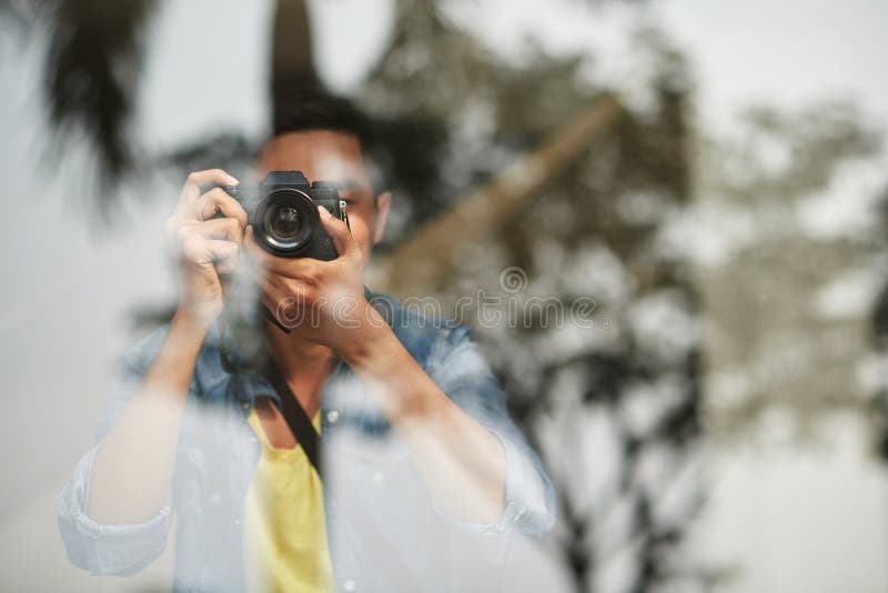 Photographing through glass stock photo