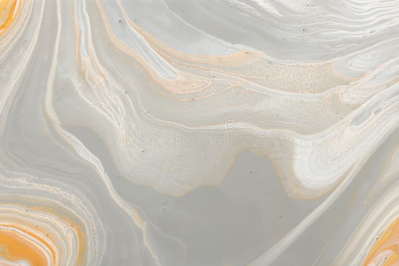 Photography of abstract marbleized effect background. gray, gold and white creative colors