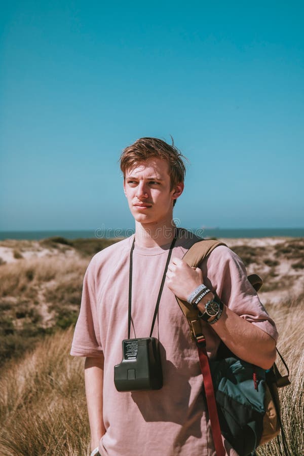 Photography Of A Man Carrying Bag Picture. Image 116695870