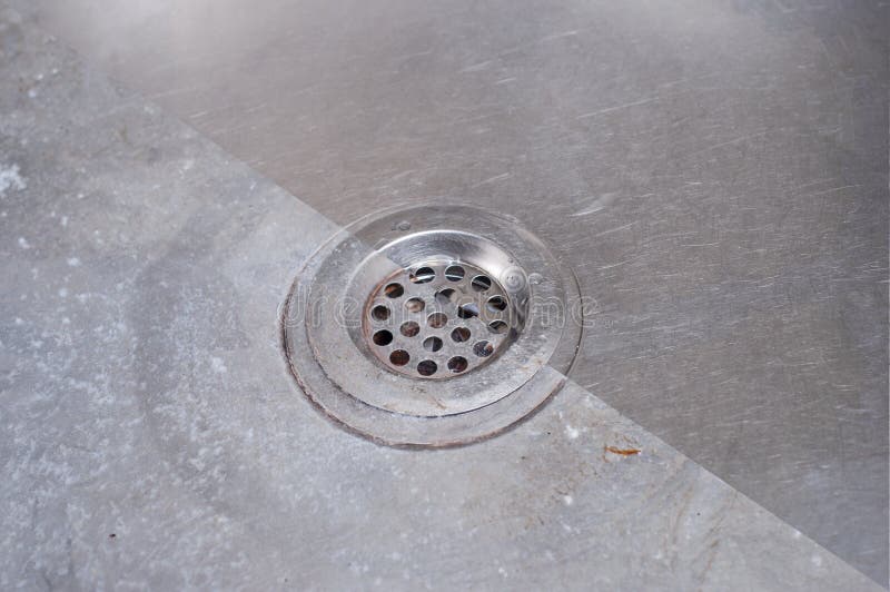 Photos before and after Washing the Kitchen Sink from Dirt on the Drain