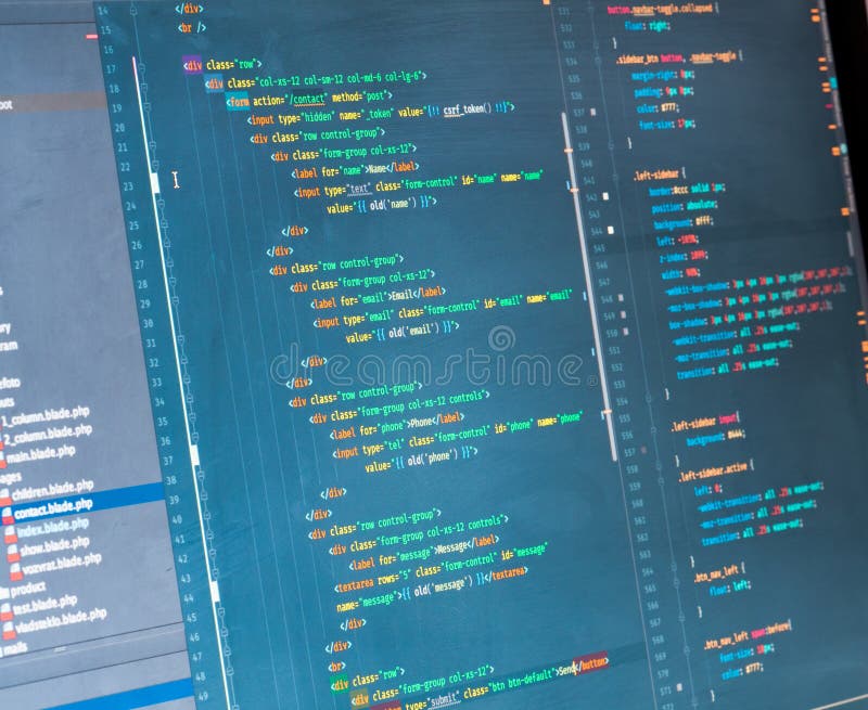 PHP code on the screen, close up. Orange, green and yellow coding on blue background stock images PHP code on the screen, close up. Orange, green and yellow coding on blue background stock images