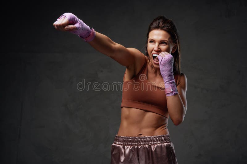Screaming Female Fighter Punching Concentrated on Her Workout Stock Image -  Image of scream, concentration: 213935809