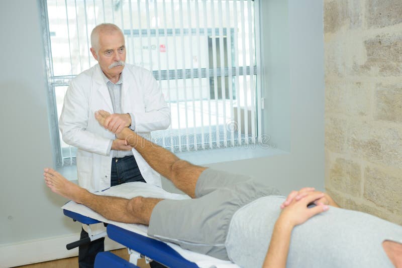 Physical Therapist Massaging Feet Client Stock Photo Image of profession, therapy 99253974