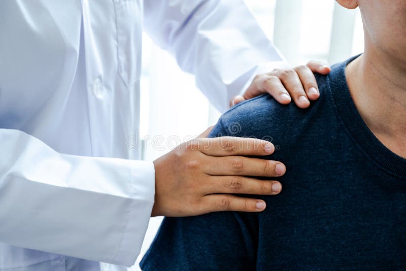 Physical Therapy Hands Doing Shoulderbtherapy for Patients in the
