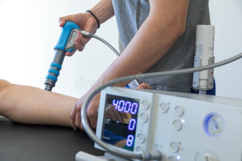 Physical Therapy of the Knee and the Foot with Shock Wave Stock Photo