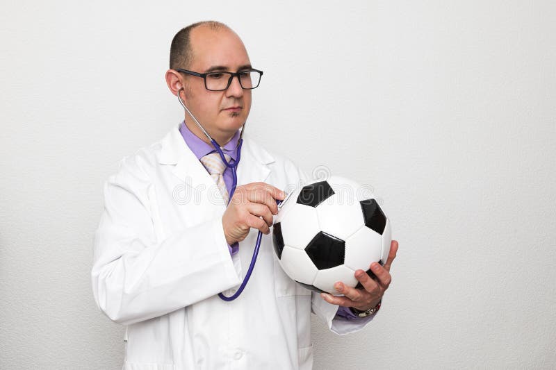 Doctor Holding Soccer Ball Stock Photos - Free & Royalty-Free