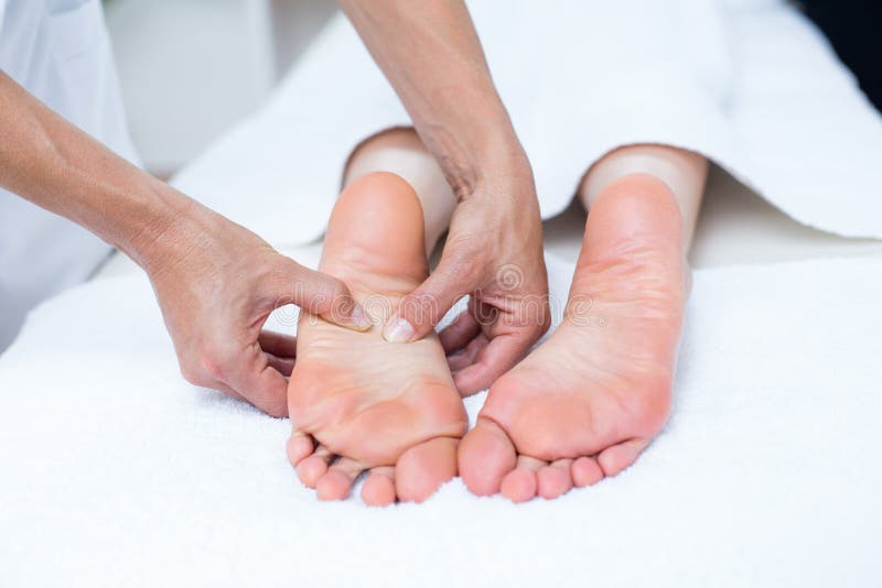 Physiotherapist Doing Foot Massage Stock Photo Image of lying
