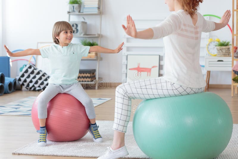 Young boy doing stretching exercise stock images Young boy doing stretching exercise stock images