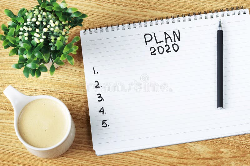 Inscription Plan 2020 in notepad, close up, top view, concept of planning, goal setting. Inscription Plan 2020 in notepad, close up, top view, concept of planning, goal setting
