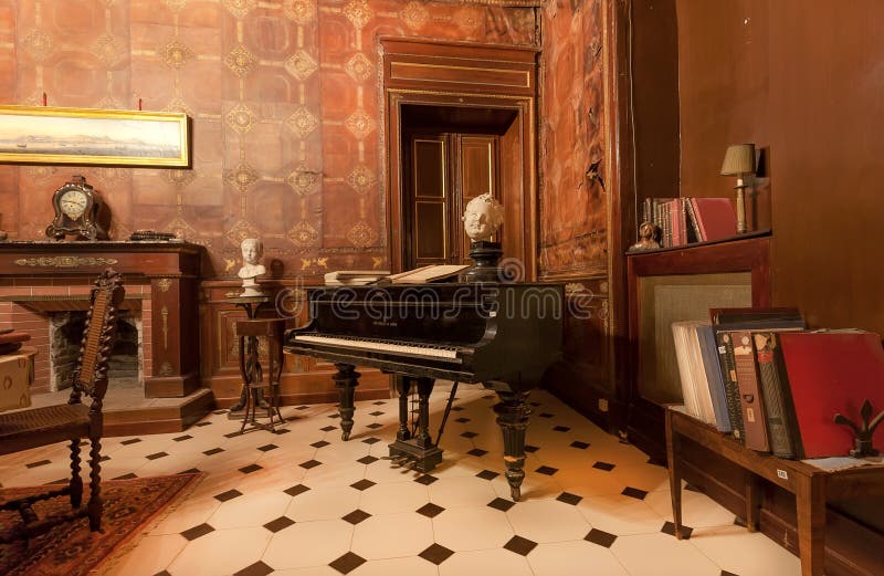 PALERMO, ITALY: Piano and antique books inside historic Palazzo Alliata di Villafranca, a Baroque aristocratic home with vintage interiors on 10 October 2019. Giuseppe Garibaldi lived in house in 1860. PALERMO, ITALY: Piano and antique books inside historic Palazzo Alliata di Villafranca, a Baroque aristocratic home with vintage interiors on 10 October 2019. Giuseppe Garibaldi lived in house in 1860