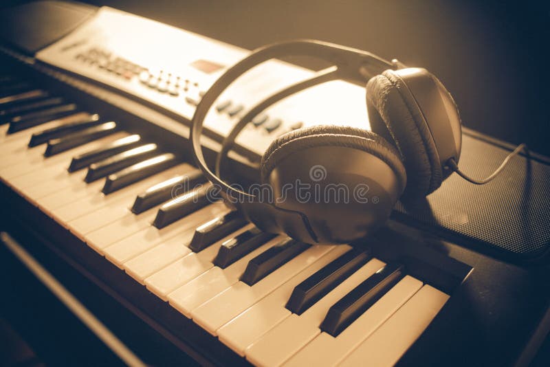 Piano Keyboard with Headphones Stock Photo Image of sound, keyboard