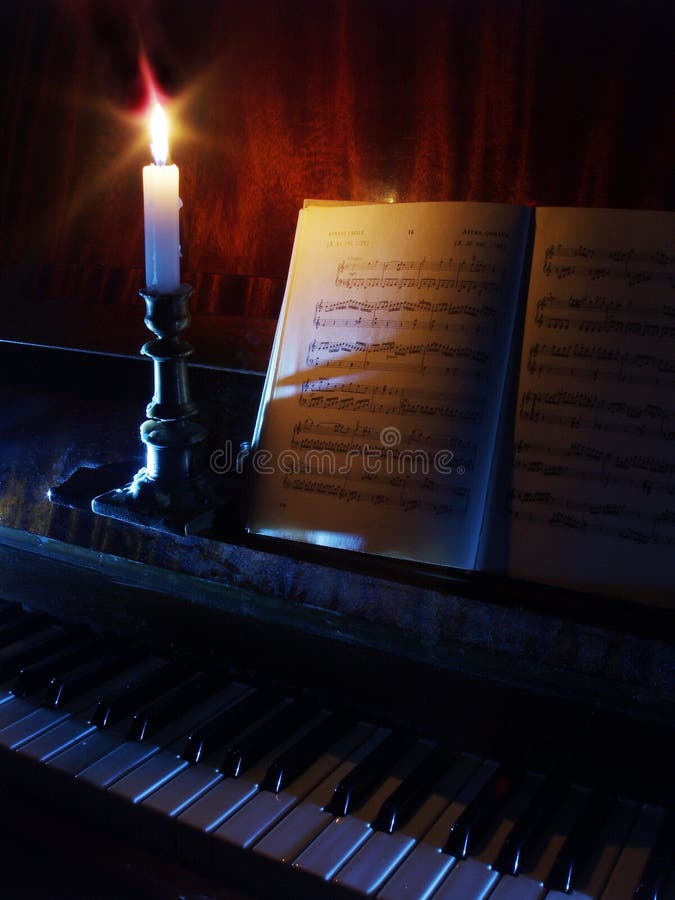 Piano and Sheet Music in the Candle Lighting Stock Photo Image of book, candlestick 500410