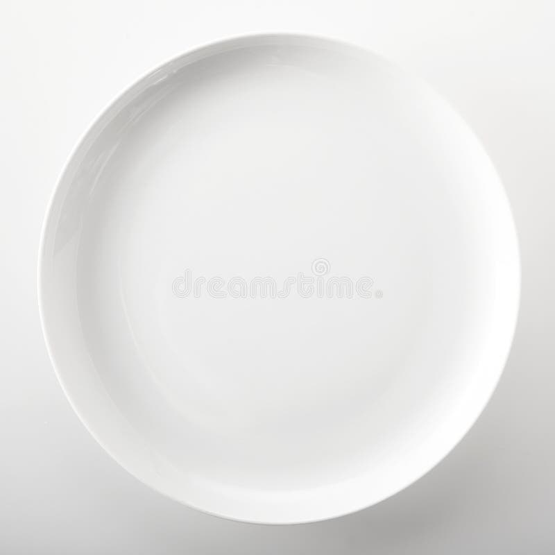 Empty plain white round generic dinner plate with place for placement of food or a recipe viewed close up overhead over a white background in square format. Empty plain white round generic dinner plate with place for placement of food or a recipe viewed close up overhead over a white background in square format