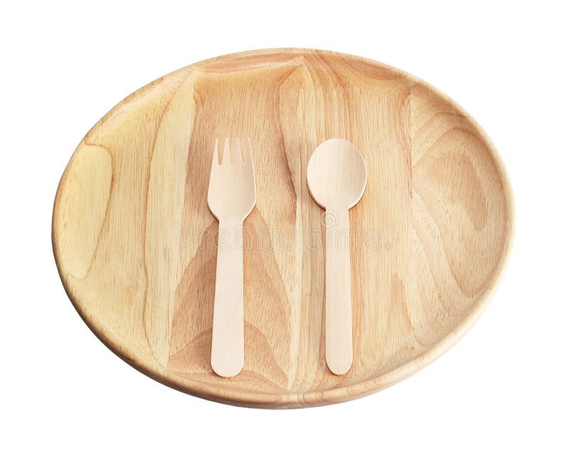 Piatto e cucchiai di legno, forcelle su fondo bianco fotografia stock Piatto e cucchiai di legno, forcelle su fondo bianco fotografia stock