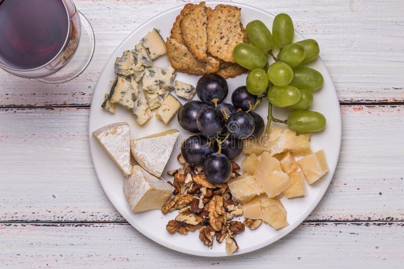 Piatto heese del ¡ di Ð con vino fotografia stock libera da diritti Piatto heese del ¡ di Ð con vino fotografia stock libera da diritti