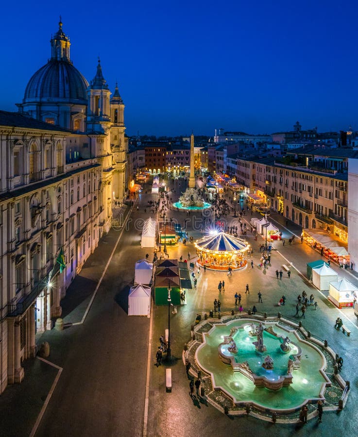 Piazza Navona is a square in Rome, Italy. It is built on the site of the Stadium of Domitian, built in the 1st century AD, and follows the form of the open space of the stadium. Piazza Navona is a square in Rome, Italy. It is built on the site of the Stadium of Domitian, built in the 1st century AD, and follows the form of the open space of the stadium.