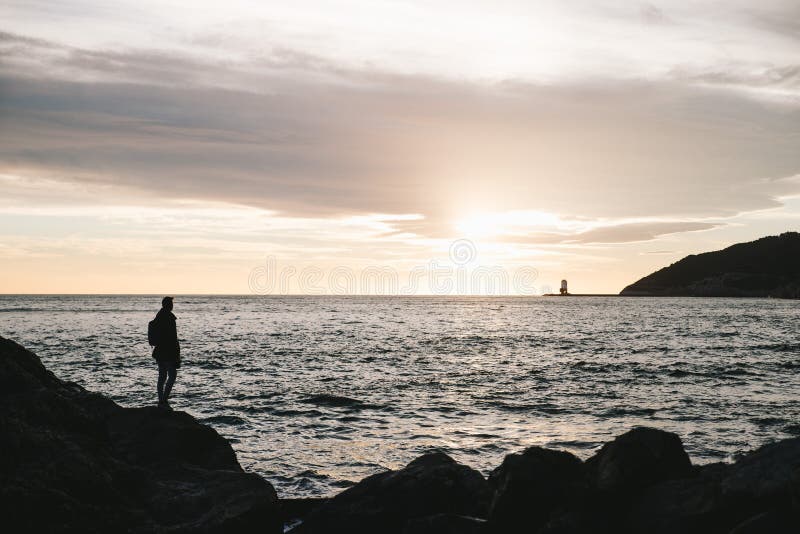 Sunset Beach landscape and a man silhouette