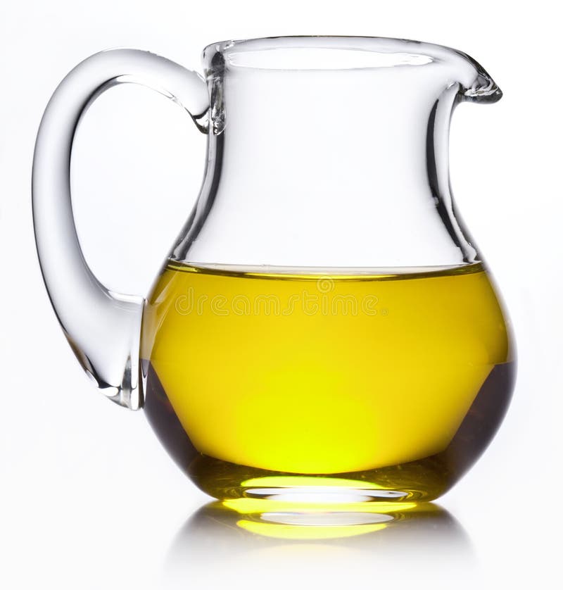 Piccola brocca con l'olio di oliva. immagine stock Piccola brocca con l'olio di oliva. immagine stock