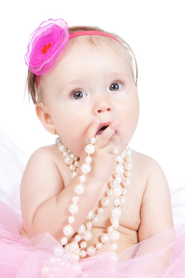 Piccola neonata della principessa con gli accessori immagine stock Piccola neonata della principessa con gli accessori immagine stock