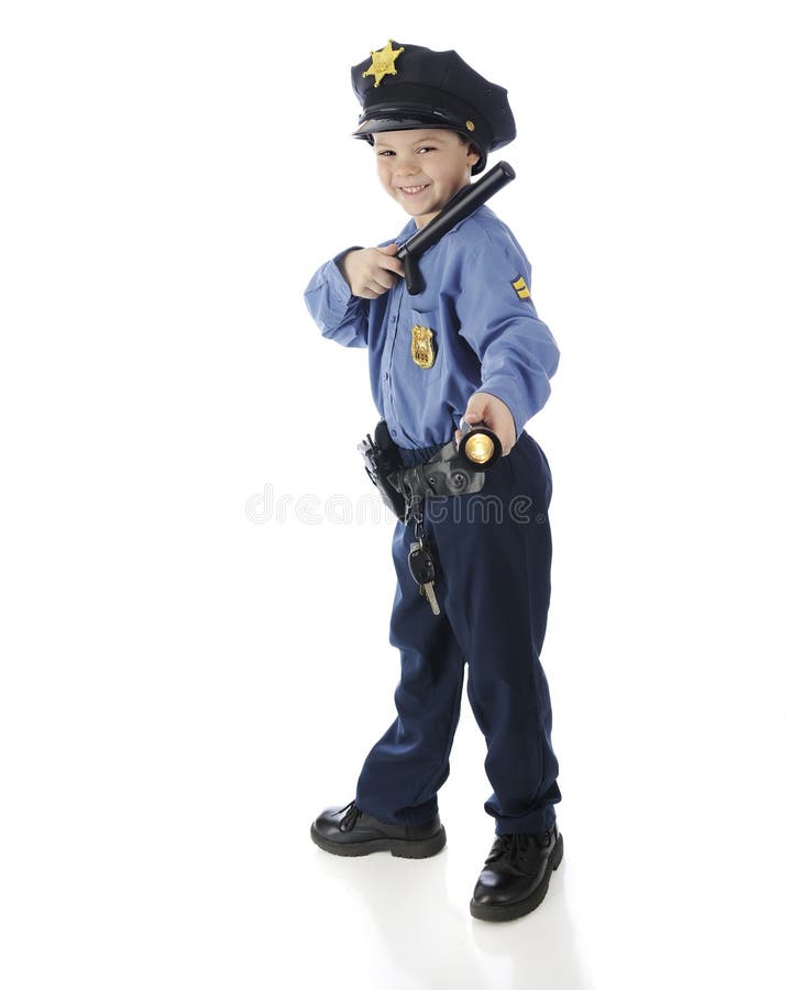 Full length image of a young elementary policeman happily shining his flashlight. On a white background. Full length image of a young elementary policeman happily shining his flashlight. On a white background.