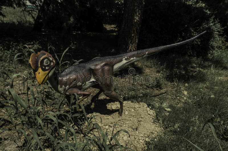 The statue of a small dinosaur in the Abruzzosauro dinosaur parc. The statue of a small dinosaur in the Abruzzosauro dinosaur parc