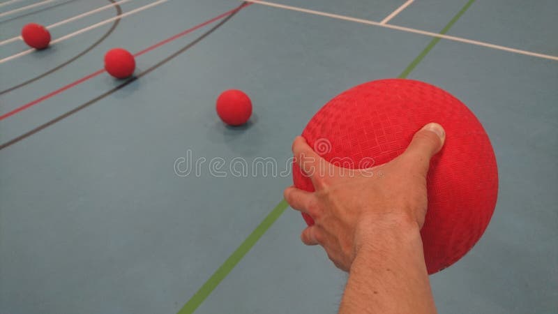 picking-up-dodgeball-my-left-hand-competing-dodge-ball-grabbing-holding-gripping-clutching-squeezing-throwing-grasping-117669676.jpg