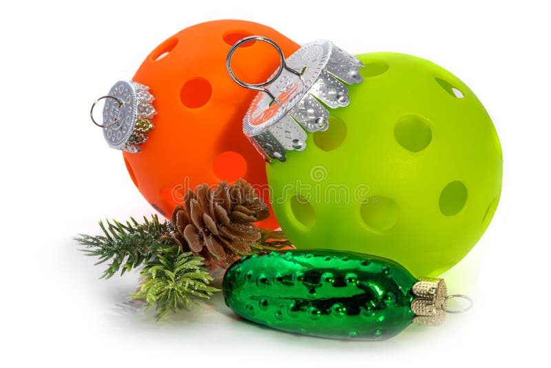 Pickleball Christmas decoration.  Orange and Green Pickleballs dressed for the tree. Add a Pickle Please.