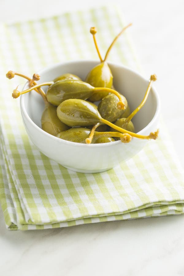 Pickled caper berries. stock photo. Image of kapers 100553254
