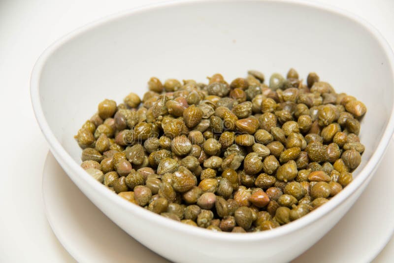 Pickled Caper in Small White Bowls Stock Image Image of marinated